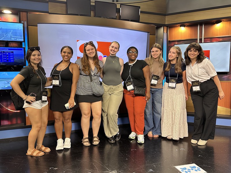 High School Summer Workshop participants pose for a photo in the KOMU-TV news studio on June 25, 2025.